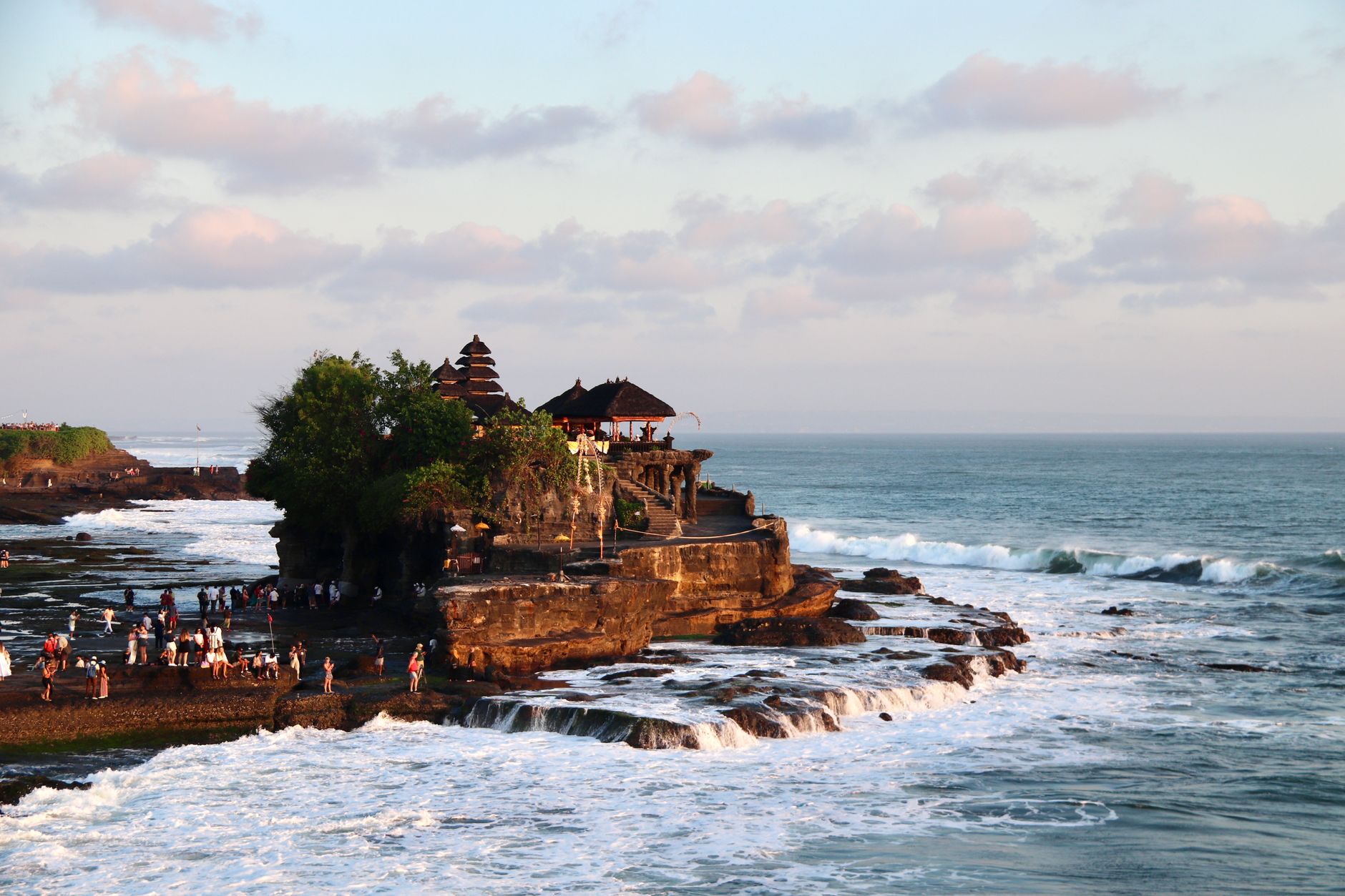 The Tanah Lot sea temple silhouetted at sunset, Bali