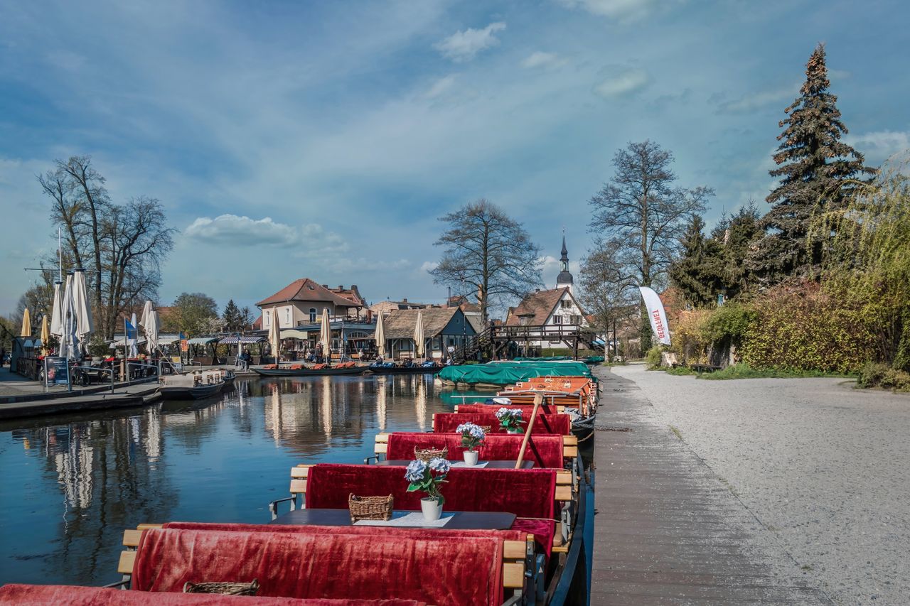 Traditional flat punt boats moored on a canal in the Spreewald near Lübbenau