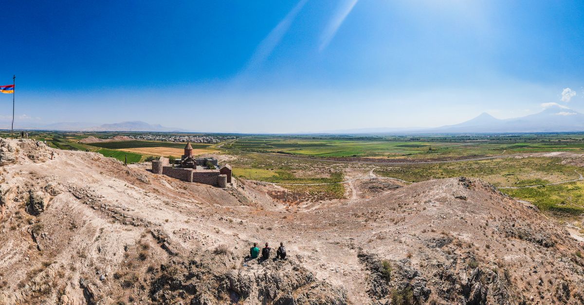 Khor Virap monastery on its hill with Mount Ararat rising behind it